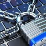 keyboard is wrapped in chains and padlocked