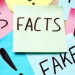 Post-it notes implying fake news and lies